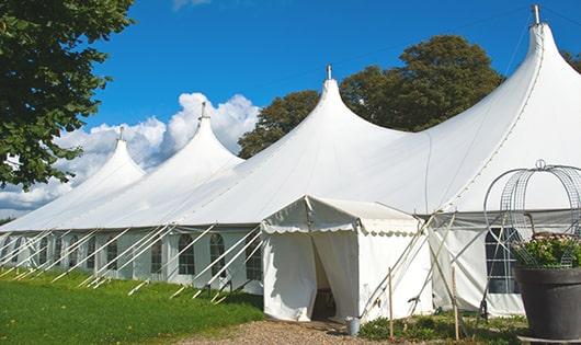 a group of luxury portable restrooms with individual stalls and running water in Enfield, CT